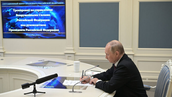 путін
