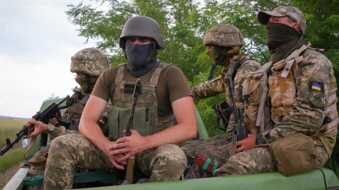Захисники України